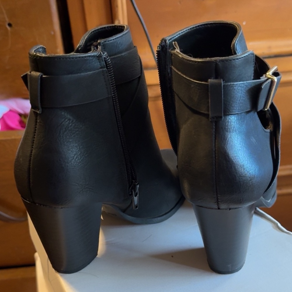 Black booties with buckle